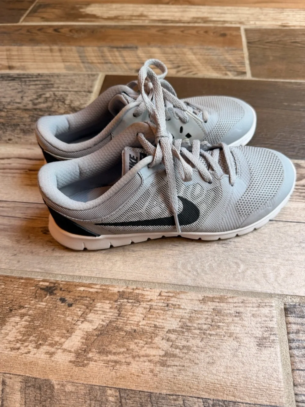 Nike Light Gray Mesh Sneakers with Black Swoosh